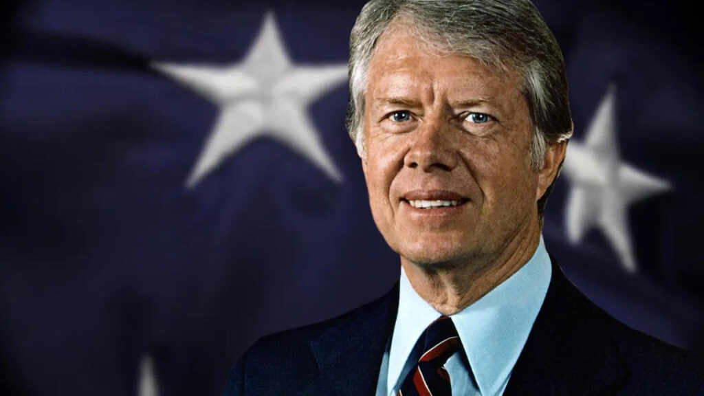 President Jimmy Carter in front of the American Flag
